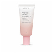Her Choice Premium Tinted Sunshield SPF50 with broad spectrum UVA/UVB protection for daily facial sun care.